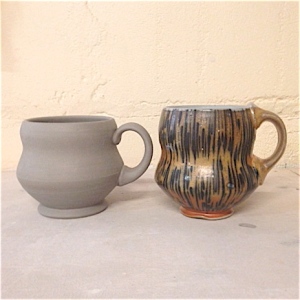 This mug is by Aaron Sober, circa 2009, I have always admired the girth paired with the gentle angles.  The mug on the left is one of my efforts.